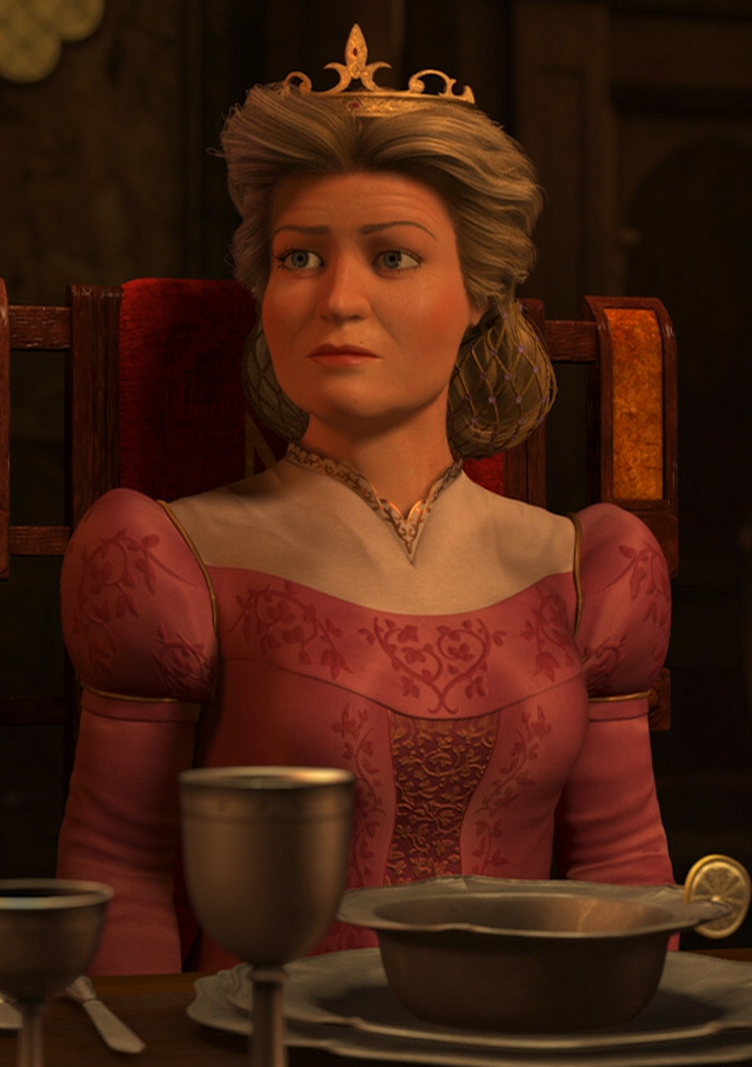 Queen Lillian sitting at the dining table.
