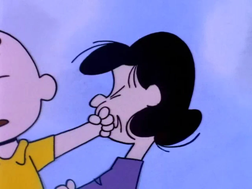 Image Charlie punches Lucy.JPG Peanuts Wiki