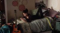 Callie laying on the bed