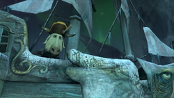 Mock Turtle with his ship in a bottle